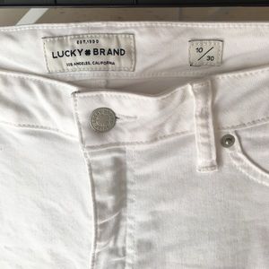 Distressed hem, ankle skinny jeans